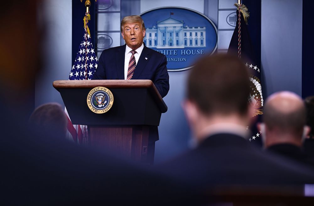 Trump addressing press reporter in whitehouse