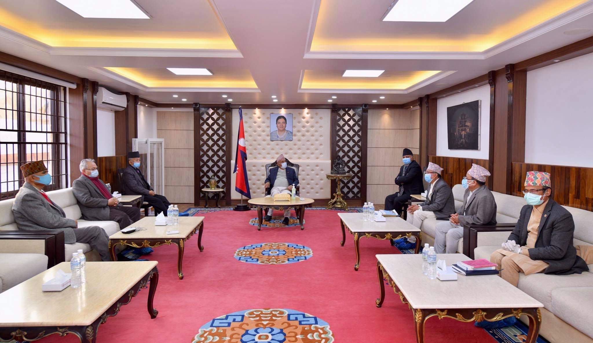 pm oli with election commission